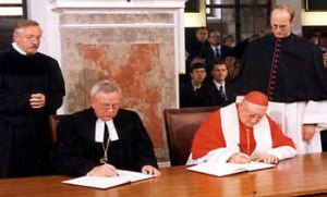 1999 signing of the Joint Doctrine of the Doctrine of Justification (JDDJ) with Bishop Dr. Christian Krause (left) and Edward Idris Cardinal Cassidy (right) (source: elcic.ca)